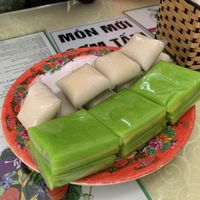 Don't let the neon green color fool you... Those rice and green been cakes are totally awesome. at Thuy in Da Nang
