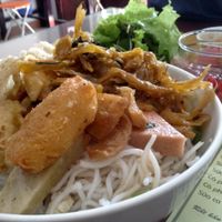 The Bun Rieu at Au Lac with its complementary lettuce and sprouts salad along with the chili sauce available at each table. at Au Lac in Da Nang