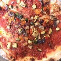 Pizza without cheese, with vegetables on top   at Gino's in Venice