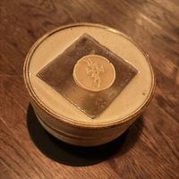 White Russian with SIC chocolate coin at Speak In Code in Manchester