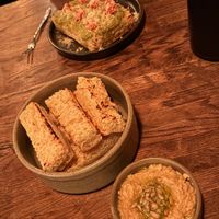 Houmous and focaccia plus Green sunflower pesto on toasted homemade focaccia  at Speak In Code in Manchester