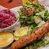 Red cabbage, arugula salad and vegan sausage at Wirtshaus in Los Angeles