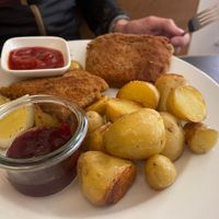 Schnitzel with roasted potatoes and gooseberry jam  at Dada in Regensburg