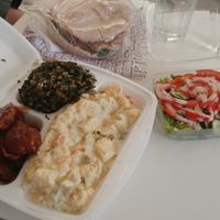 some good old bbq seitan twist, greens, potato salad that's to die for, and salad on the side. also a sandwich with fried seitan. at The Miznon in Dimona
