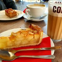 Vegan apple pie and latte macchiato with oat milk at Coffee Fellows - Berliner Allee in Dusseldorf
