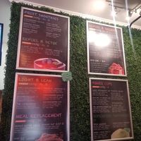 Smoothie menu board at Naked Vegan in Greenville