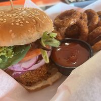 Project Chic Sandwich with onion rings   at Naked Vegan in Greenville