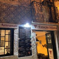 Patio light is BRIGHT but the music and service were great, lots of fun   at Estação Alfama Pizzaria in Lisbon