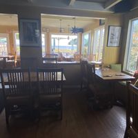 Indoor seating with ocean view  at Waydowntown in Provincetown