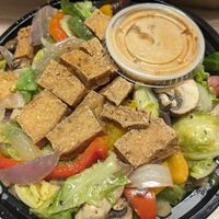 Veggie bowl with tofu and peanut coconut sauce. at Drastix in Hollywood