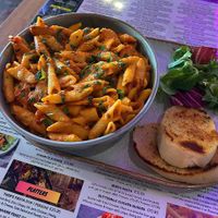 Zeze's Pasta with garlic bread at Jungle Street Kitchen in Lichfield