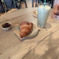 Croissant with jam, silk vanilla protein shake at Copper Branch in Utrecht