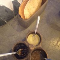 The green souce is vegan. The other one is Avocado-Mayonnaise & the red one is "chicatanas" souce made of ants at Metxcalli in Oaxaca