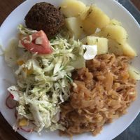 Warm cabbage, potatoes, two different salad s and kofta  at Vega in Warsaw
