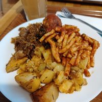Potatoes with pasta. On the side is cabbage and kofta with tomato sauce at Vega in Warsaw