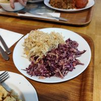 Celery salad with apples, red cabbage salad with apples at Vega in Warsaw