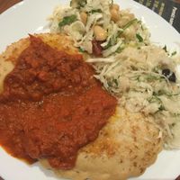 salad sauce and lentils cake at Vega in Warsaw