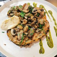 Mushroom toast on beans + hummus with pesto sauce at Aussie Coffee Ipanema in Rio De Janeiro