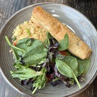 Vegan sausage roll with side salads  at Synge & Byrne in Londonderry