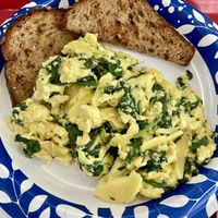Just Egg scramble with cheese and spinach 😋   at Meals From The Heart Cafe in New Orleans