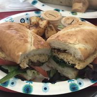 Vegan crab cake po’boy with potatoes at Meals From The Heart Cafe in New Orleans