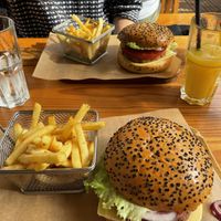 Beyond meat burger with fries and orange juice at Charcutaria e Queijaria do Mercado in Funchal