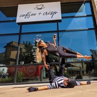 A copper and a cat burglar caffeinating at coffee + crisp.  Has seasonal events like a costume contest in October. at Coffee + Crisp in Austin
