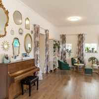 Lobby with piano at Garden Hotel Primavera in Brissago