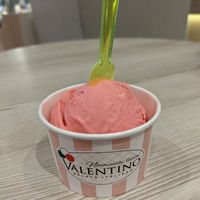 1 scoop of pomegranate gelato in a cup at Valentino Ledai in Klaipeda