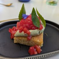 Bazbousa pastry, pistachio cremeaux and strawberries at DAR Restaurant & Cocktail Bar in Zurich