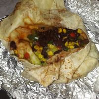 Black bean burrito with guac/onions/peppers/corn salsa at Bubbakoo's Burritos in Quakertown