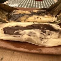 Frijol com hoja de aquacate (delante) Mole Negro (detras)  at Nuni Tamales in Tijuana