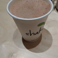 Raw cocoa with maca and hot oat milk at Shake Cafe - Via dei Neri  in Florence