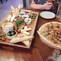 Vegan charcuterie board and duck pizza at House of Ivy in Southport