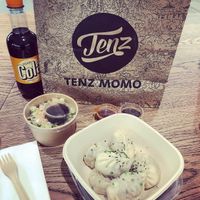 Vegan momos and cucumber peanut salad at Tenz Momo in Winterthur