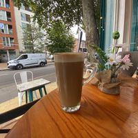 Oat milk latte and Turmeric kombucha   at Targa Green Cafe in East London