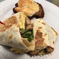 Breakfast wrap added shrimp & chicken biscuit with gravy...  at Banu Vegan in Durham