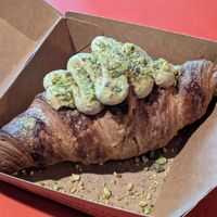 Raspberry croissant filled with pistachio cream! at Turlaj Klopsa - Karmelicka in Krakow