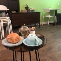 Vegan pain au chocolat with Jasmine tea  at Atlas Grinds in North London