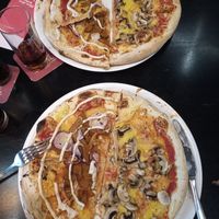 One mushroom one doner vegan pizza at Happy Italy - Kop van Zuid in Rotterdam