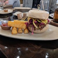 The lioness with side of yucca fries, House made ketchup at Mantra Kitchen in Houston