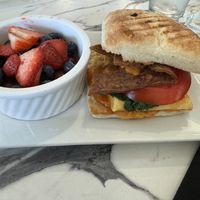 Egg and bacon with tomato, spinach and chipotle sauce. Excellent!  at Coco Bistro & Bar in Chapel Hill