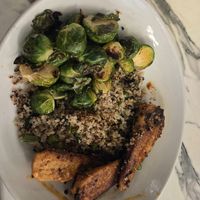Chipotle chicken with quinoa and 
brussel sprouts at Coco Bistro & Bar in Chapel Hill