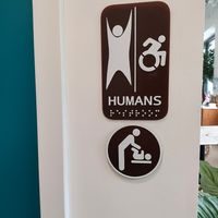 Love a fun restroom sign! at Coco Bistro & Bar in Chapel Hill
