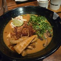 Red fire opal bowl with sautéed bamboo shoots at JINYA Ramen Bar in Charlotte