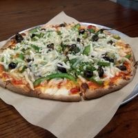 Pizza with nearly all vegan toppings and vegan cheese at Your Pie in Lumberton