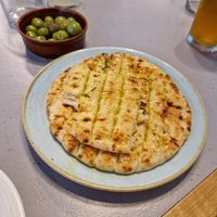 Incredible pita with garlic, olive oil, and parsley at Maray - Dockside in Liverpool