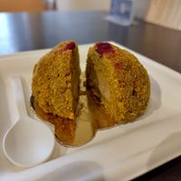 Lemon cake dessert with cashew cream inside at Grezzo Raw Chocolate in Rome