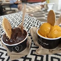 Mango and Dark chocolate. We didn’t eat the wafers because they aren’t vegan    at DaVinci Gelato in Mykonos