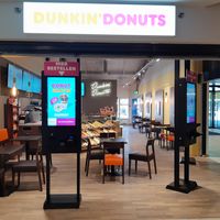 Exterior inside mall at Dunkin' in Abtwil